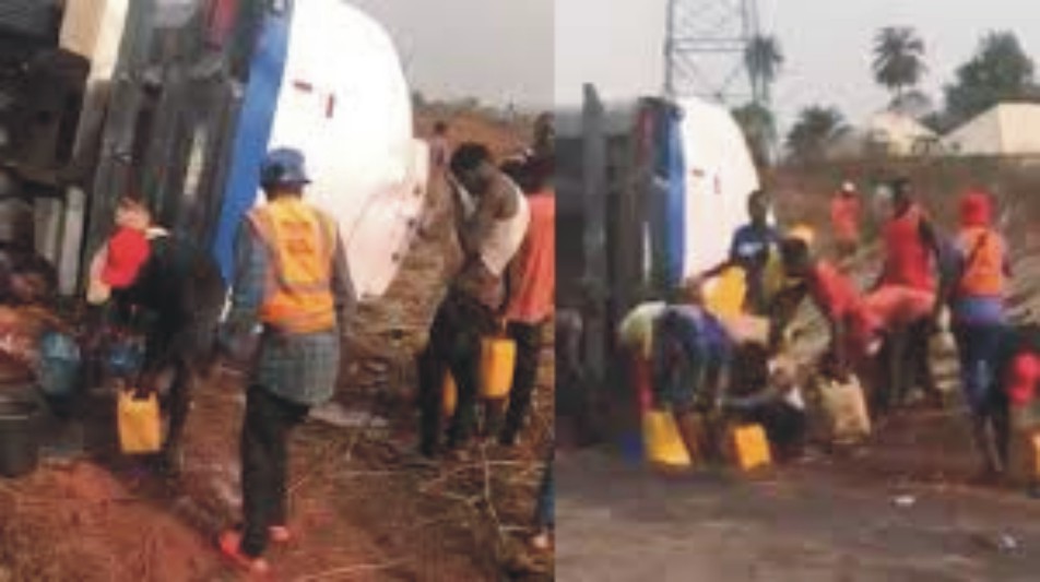 Anxious Edo Youths Put Lives in Danger, Struggle for Fuel from Overturned Tanker